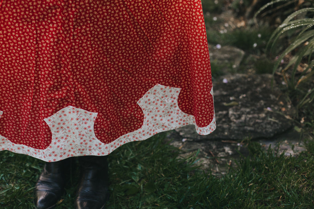 Close up of the bottom of 243 Rodeo Cowgirl Skirt shaped hem applique.