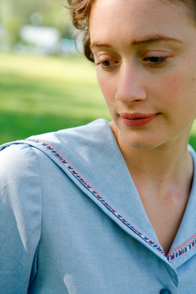 Close up of the Metro Middy Collar in blue with a red, white, and blue trim.